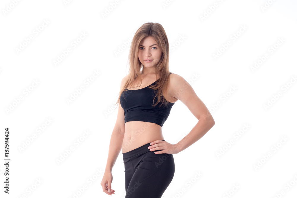 Beautiful sport sexy girl is standing and looking away Beautiful sport sexy girl is standing and looking away