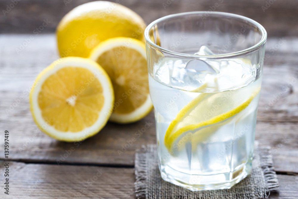 Glass of water with fresh lemon juice Glass of water with fresh lemon juice
