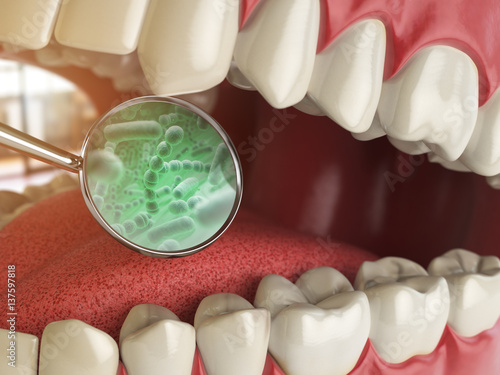 Bacterias and viruses around tooth. Dental hygiene medical concept. photo