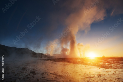 Fantastic sunset Strokkur geyser eruption in Iceland © standret