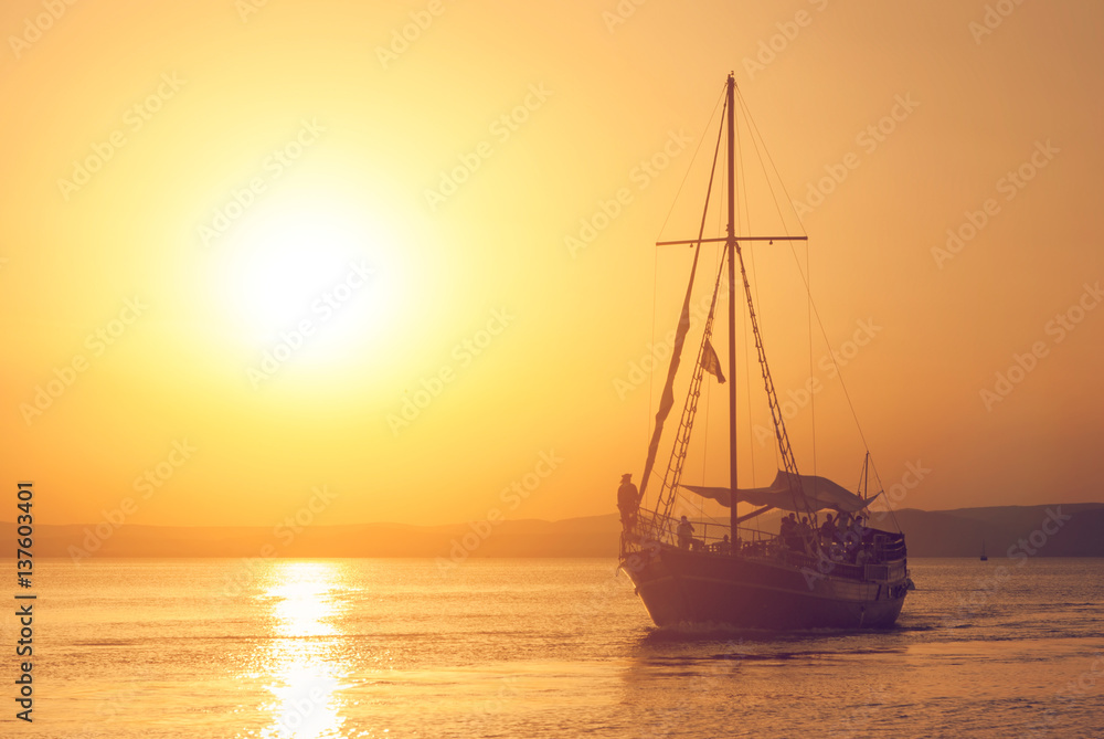 Boat sunset lake