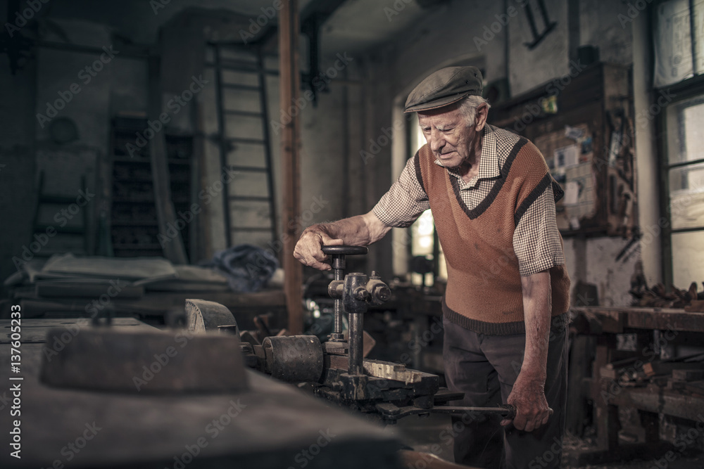 Senior carpenter in his workshop, Karanac, Baranja, Croatia Senior carpenter in his workshop, Karanac, Baranja, Croatia