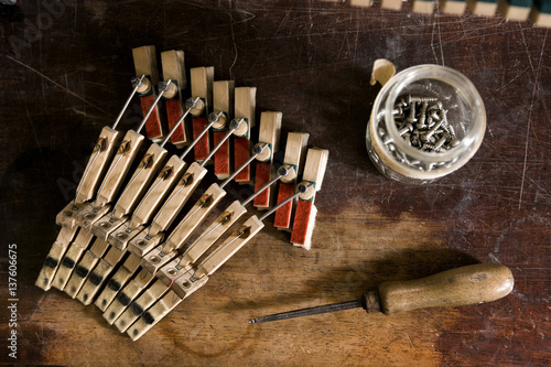 Musical mechanism of a piano alongside work tool, Regensburg, Bavaria, Germany