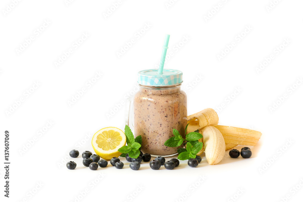 Fototapeta premium Blueberry smoothie with banana, lemon and mint leaves.