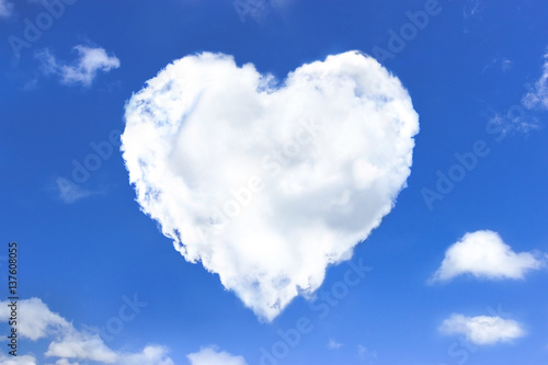 Heart shape clouds - Blue Sky Background. love concept.