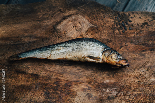 dried fish, seafood, wooden table