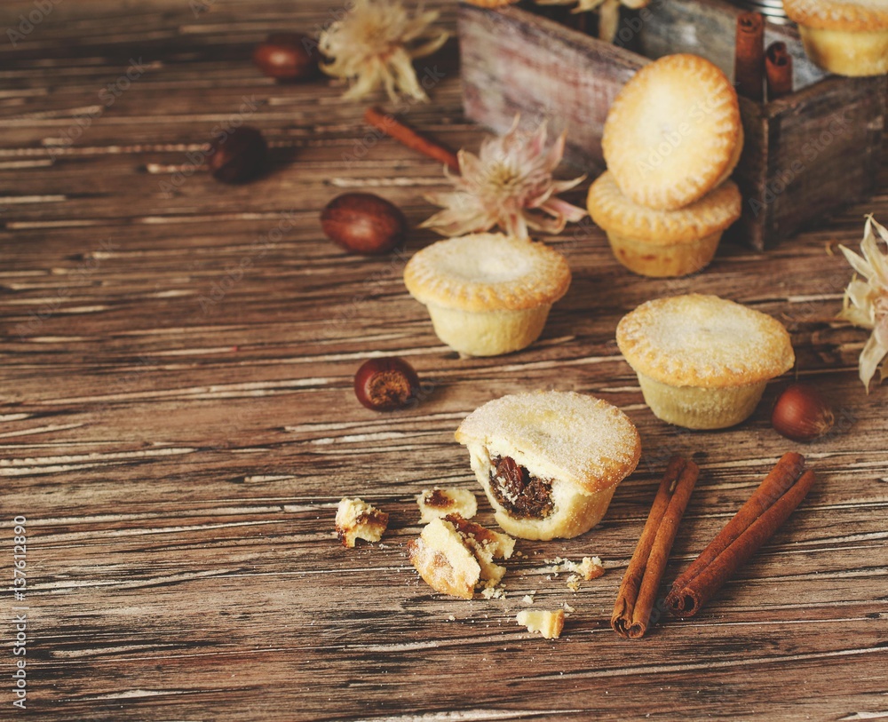 small round Christmas cakes with nuts and cinnamon, space for text small round Christmas cakes with nuts and cinnamon, space for text