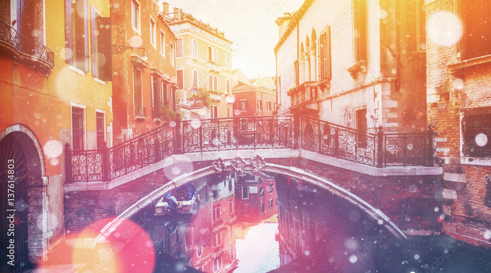 Canal with gondolas in Venice, Italy. Photo greeting card. Bokeh