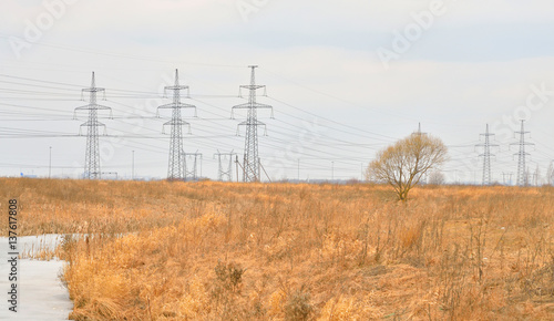 Power line in the countryside at early spring. © konstan