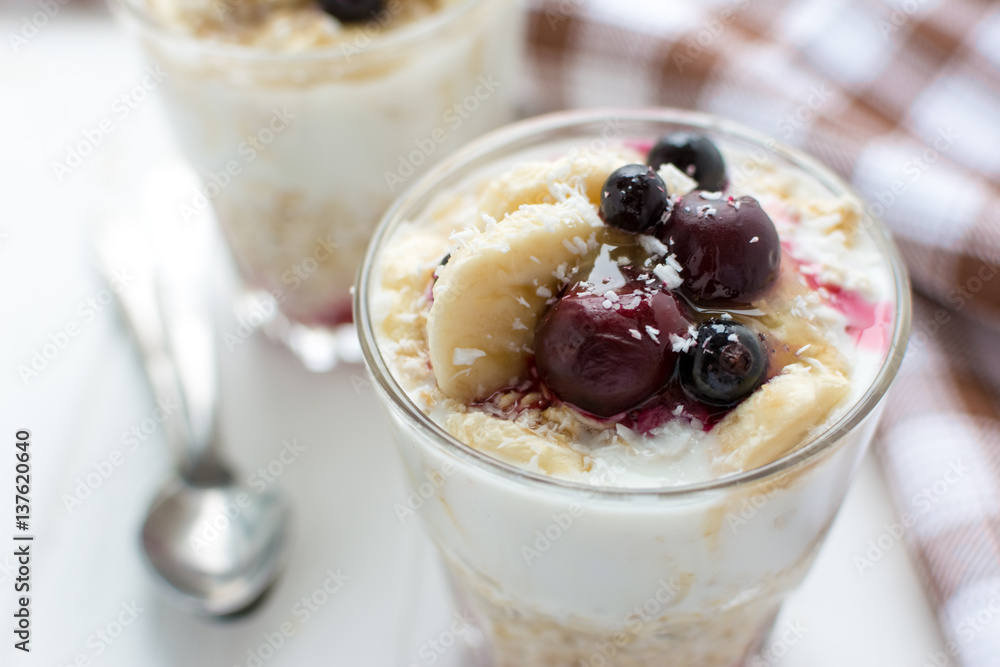 Healthy breakfast. Oatmeal with bananas, berries and honey Healthy breakfast. Oatmeal with bananas, berries and honey