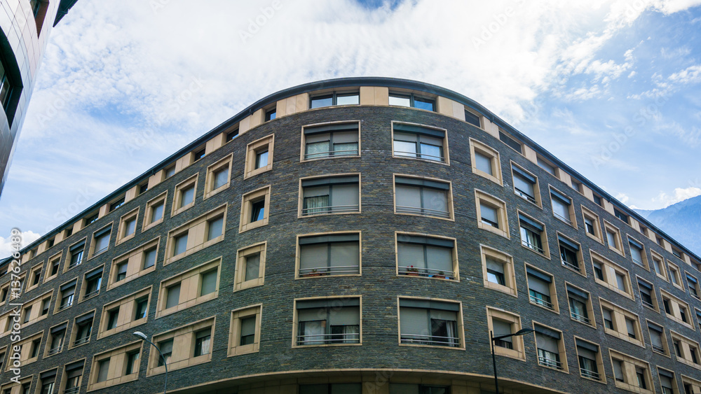 exterior of an apartment building by night