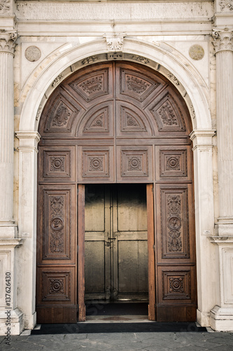 Marble portal in Gothic-Renaissance style of the dome in Montagnana, Italy.
