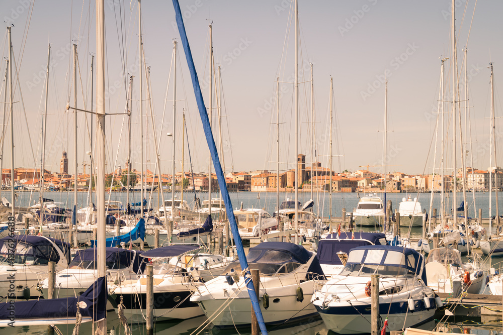 View of the tourist port of Chioggia, with the island union background.