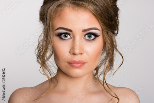 Portrait of young girl with trendy makeup