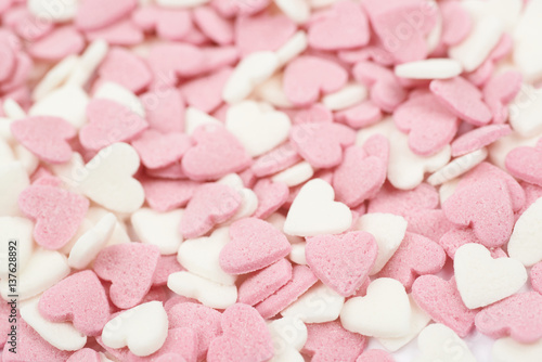 Surface coated with heart shaped sprinkles