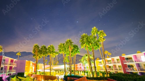 Astro Timelapse of Colorful Resort Hotel in Palm Springs -Pan Left- photo