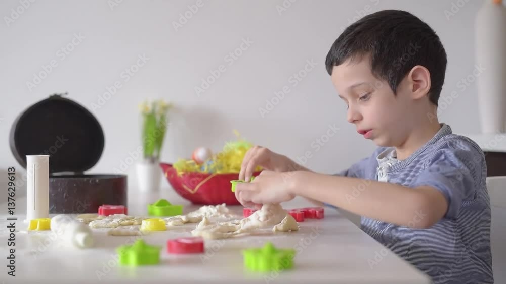 Young boy playing with dough at home Young boy playing with dough at home