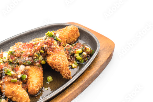 fried fish stick with spicy sauce