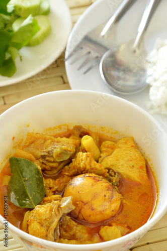 spicy chicken with egg spoiled while being incubated curry and rice