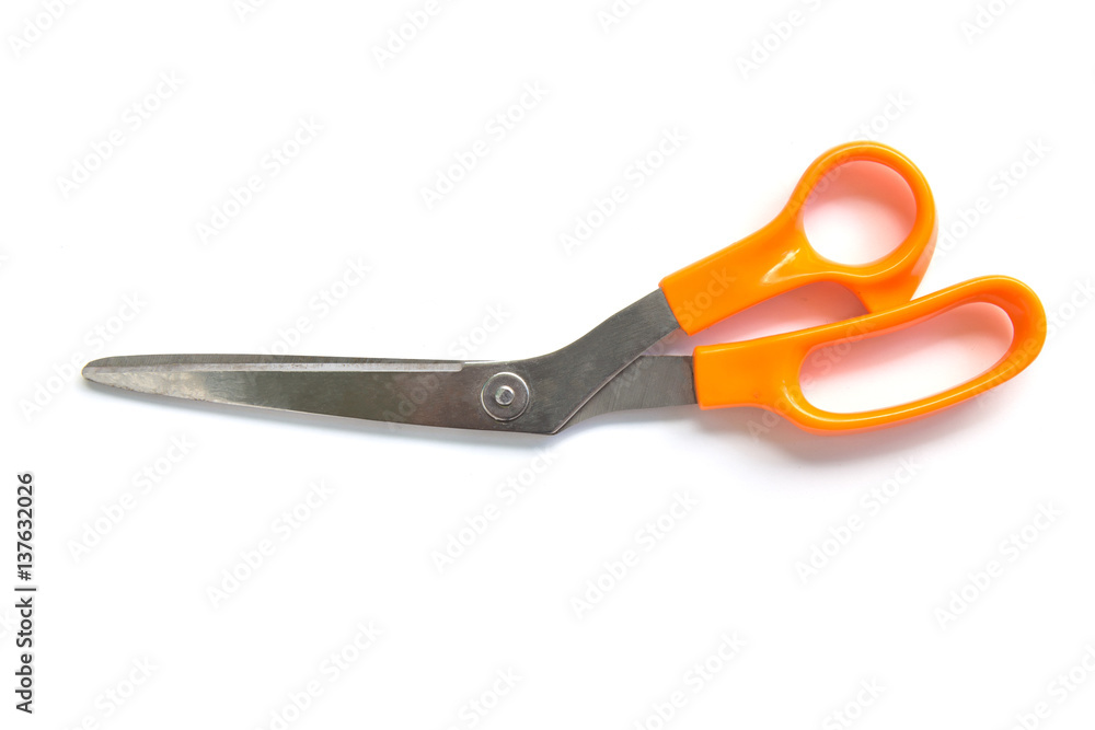 Orange scissors isolated on a white background. Orange scissors isolated on a white background.