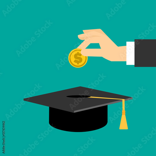 hand put gold coin in graduation cap.