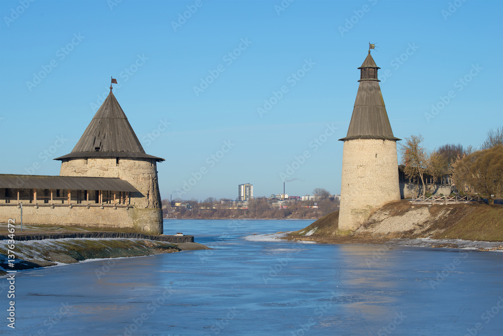 Two ancient towers of the Pskov Two ancient towers of the Pskov Kremlin on the place of confluence of Pskova and Velikaya rivers in the sunny February afternoon. Russia