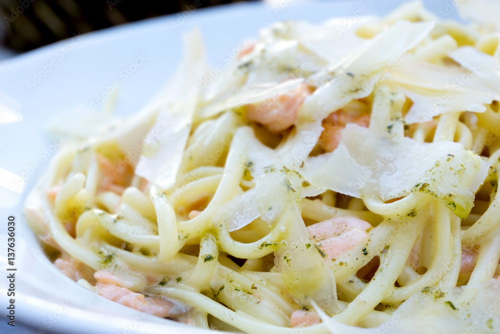 tasty pasta with salmon on a the table tasty pasta with salmon on a the table