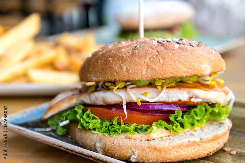 Cheese burger American cheese chicken burger with fresh salad Stock