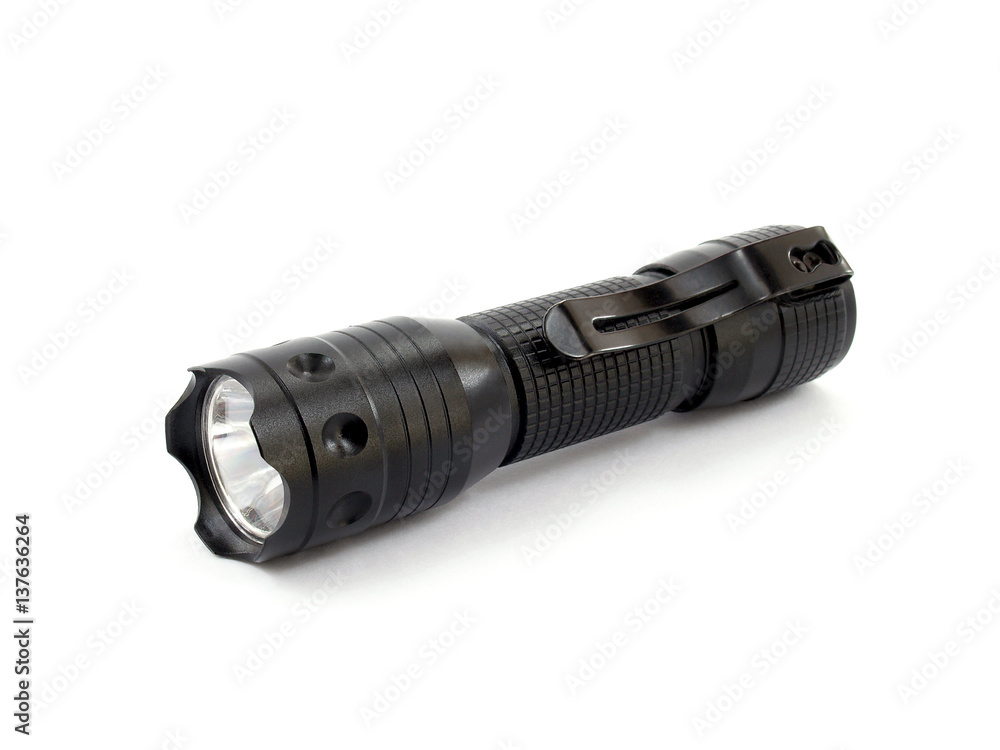 close-up small black metallic flashlight with pocket clip clamp isolated on white background, mini portable torch light for illuminate emergency close-up small black metallic flashlight with pocket clip clamp isolated on white background, mini portable torch light for illuminate emergency