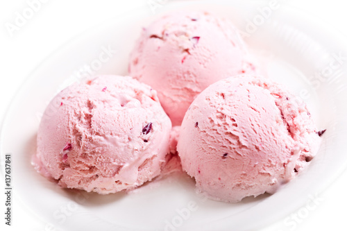 plate of pink ice cream scoops
