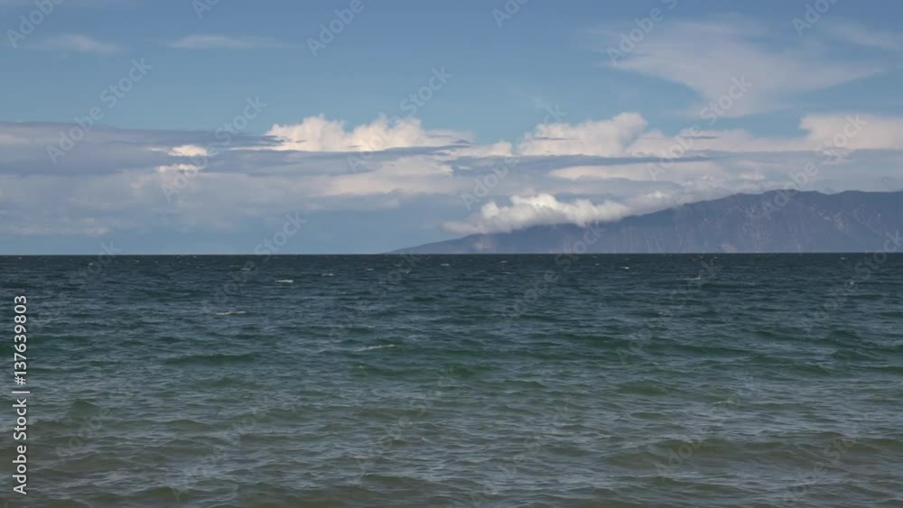 Svyatoy Nos Peninsula (Holy Nose Peninsula). View from the boat. This is the largest peninsula on Lake Baikal. The Trans-Baikal National Park, Russia. Svyatoy Nos Peninsula (Holy Nose Peninsula). View from the boat. This is the largest peninsula on Lake Baikal. The Trans-Baikal National Park, Russia.