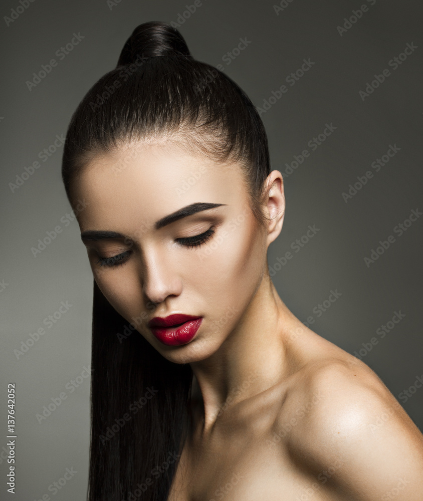 Beautiful young woman with long healthy dark hair and perfect skin Beautiful young woman with long healthy dark hair and perfect skin