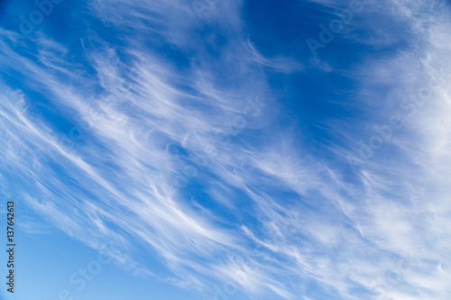 clouds in the blue sky as background