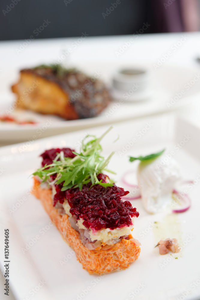 Dressed herring appetizer, Russian cuisine dish Dressed herring appetizer, Russian cuisine dish