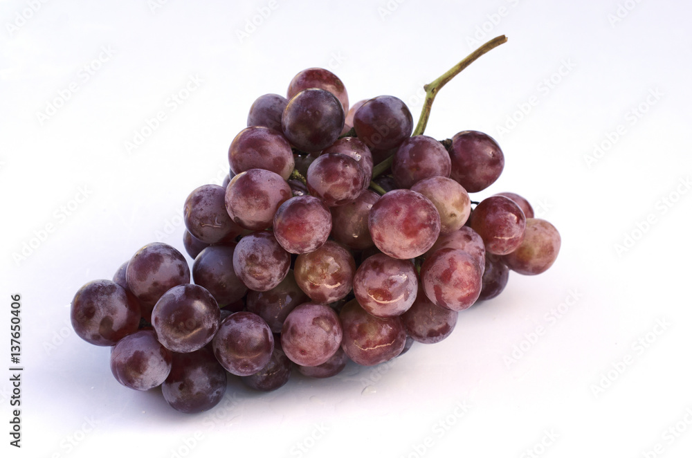Red grape fruits macro close up Isolated on white backgrounds Red grape fruits macro close up Isolated on white backgrounds