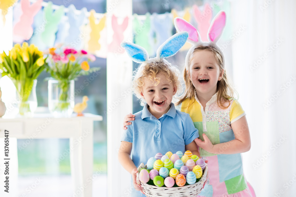 Kids with eggs basket on Easter egg hunt Kids with eggs basket on Easter egg hunt