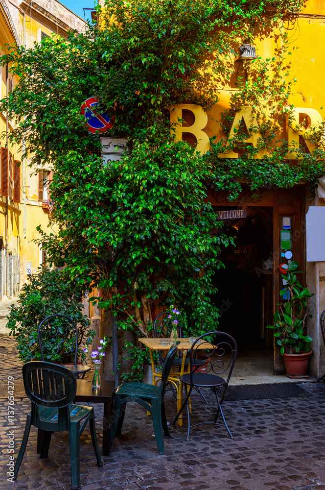 Fototapeta premium Cozy old street in Trastevere in Rome, Italy