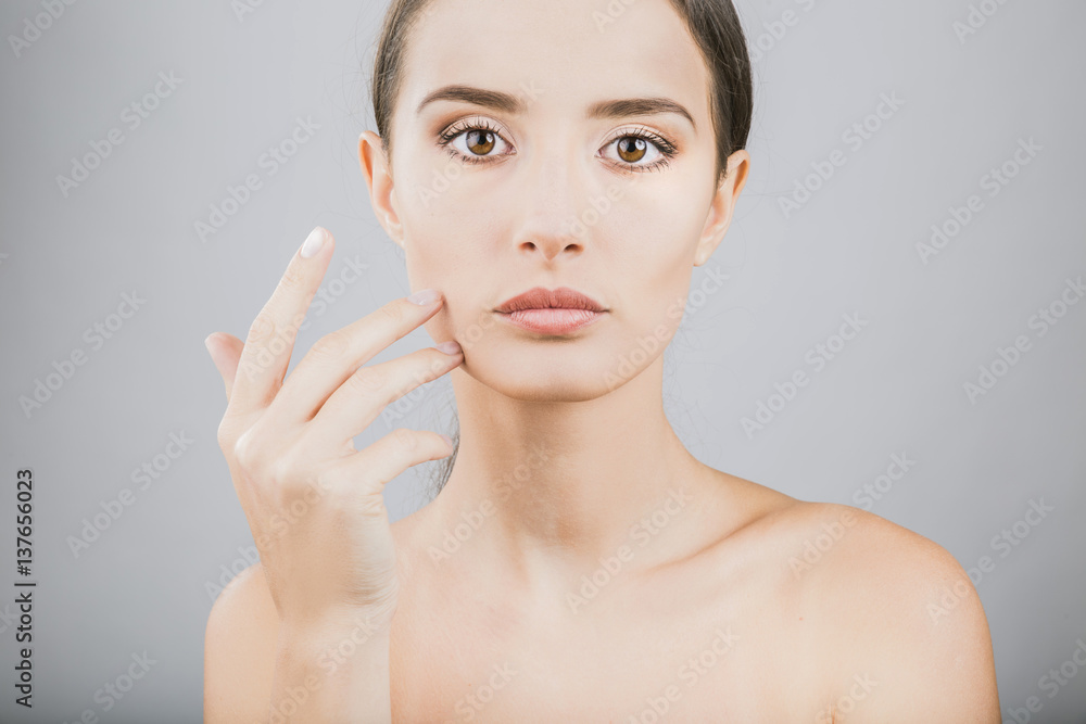 beauty girl on the grey background beauty girl on the grey background