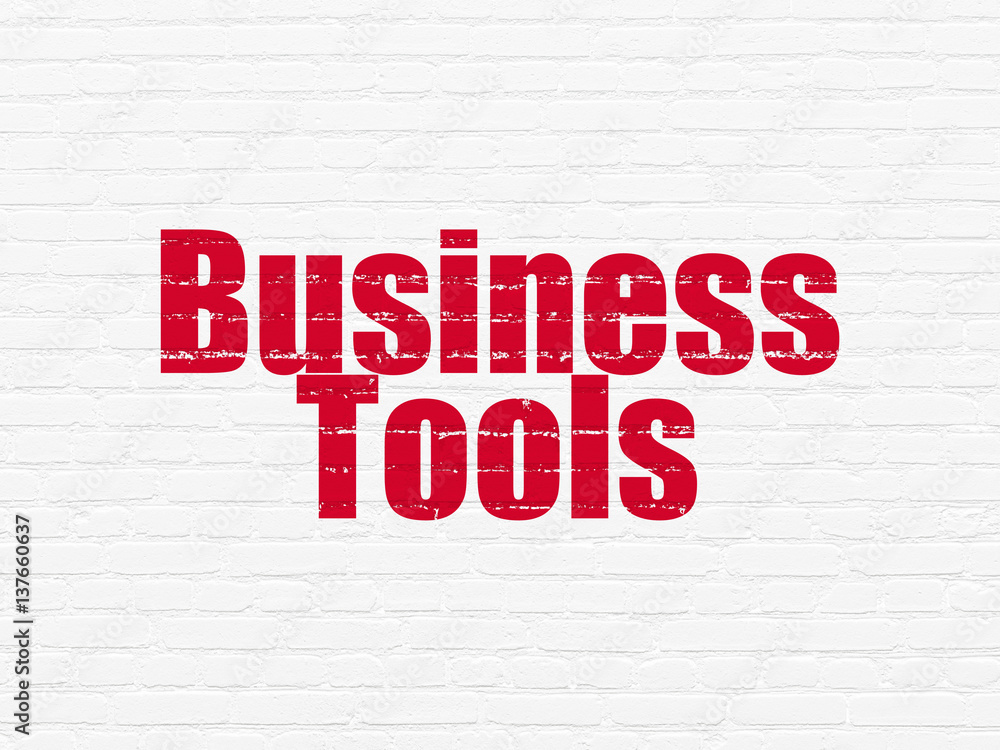 Business concept: Business Tools on wall background Business concept: Business Tools on wall background