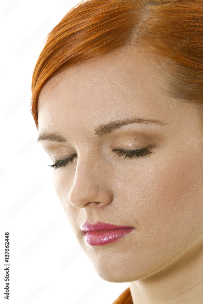 Fototapeta premium Serious, thoughtful young woman with closed eyes
