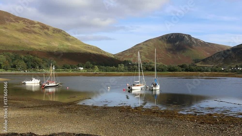 Peak of Torr Nead an Eoin and sailing boats in Loch Ranza, Lochranza Isle of Arran Scotland
