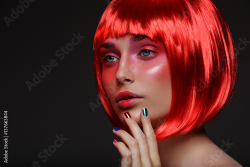 Beautiful girl in red wig