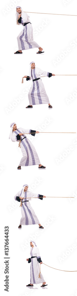 Arab man in tug of war concept Arab man in tug of war concept