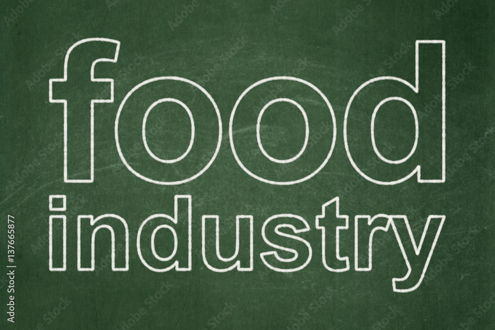 Fototapeta premium Manufacuring concept: Food Industry on chalkboard background