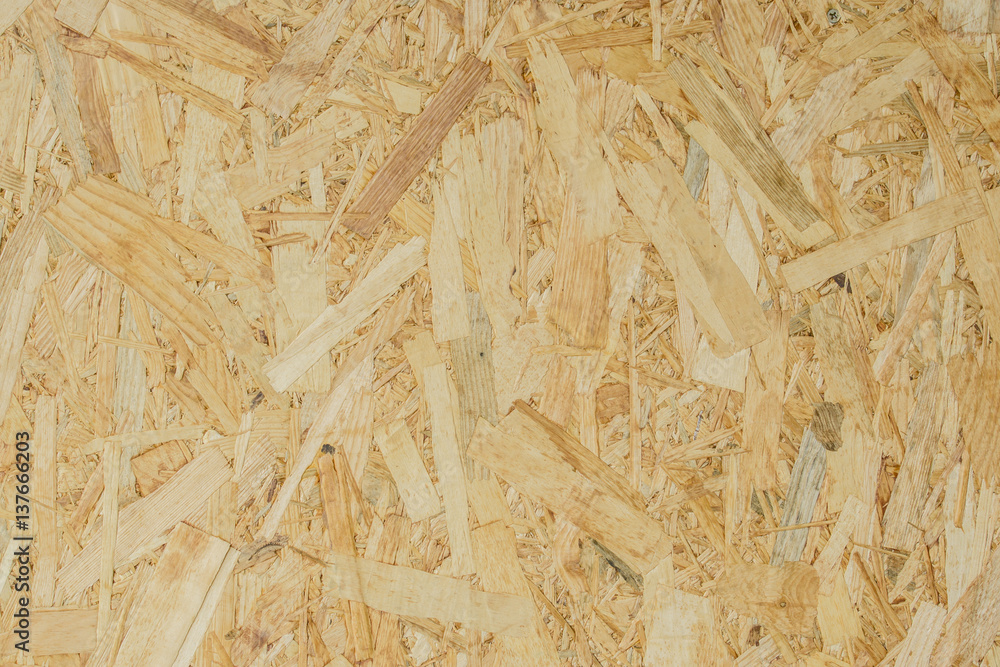 abstract background texture of Wood chips felted brown color (OSB) abstract background texture of Wood chips felted brown color (OSB)