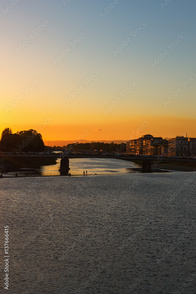 Sunset over the river in Florence
