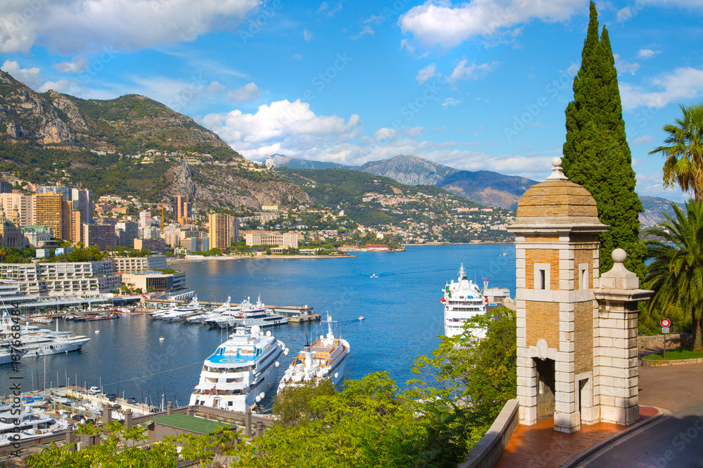 Principality of Monaco. View of the seaport and the city of Monte Carlo with luxury yachts and sail boats 