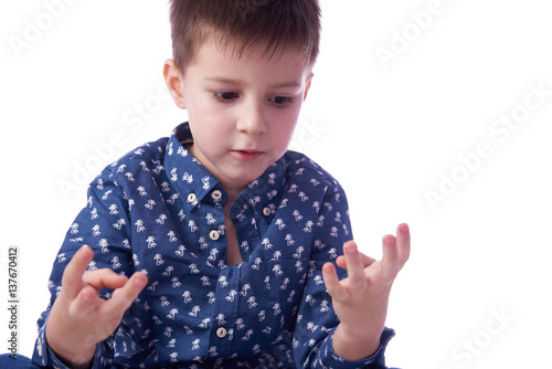 Kid counting on fingers.