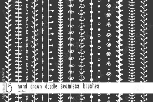 Set of hand drawn doodle seamless decorative brushes for dividers, borders, ornaments, frames, borders and design elements isolated on black background. Vector brushes are included in the brush panel.