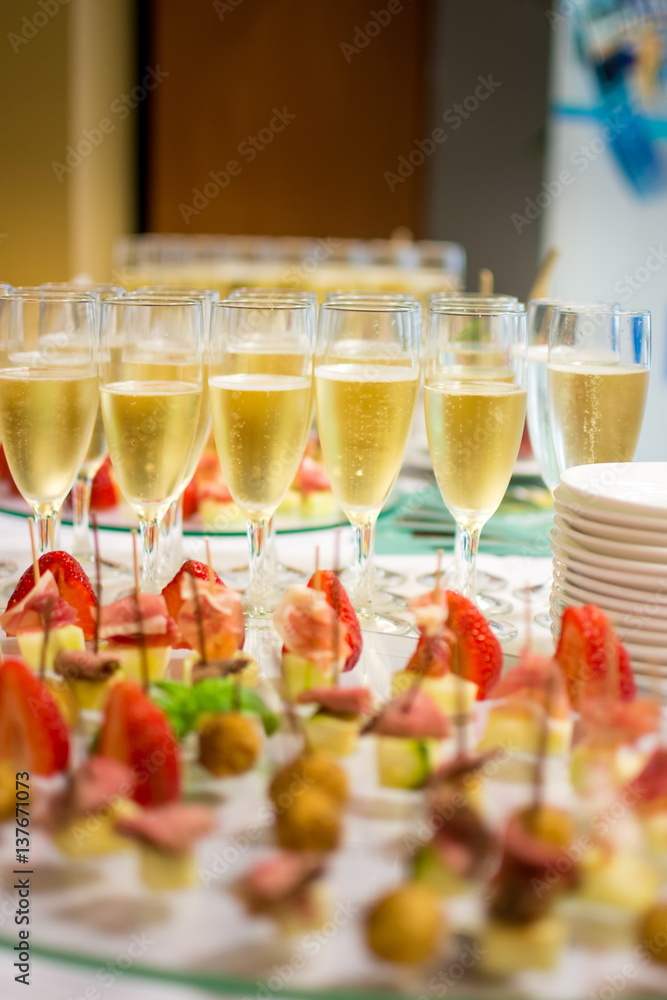 Glasses of champagne and strawberries Glasses of champagne and strawberries